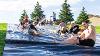 New students slide down the giant slip n slide