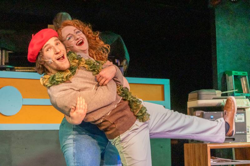 Two BHSU Theatre students dancing together, the female actor dipping the male.