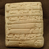 One Humbert clay tablet displaying primative writing.
